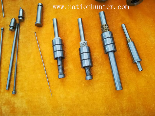 Guide post with ball retainer and bushing