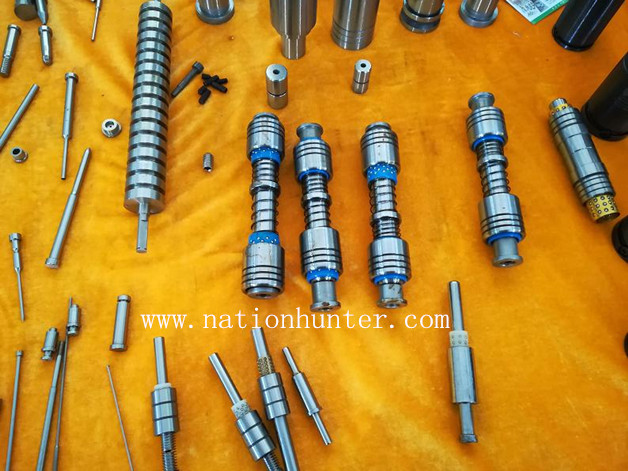 Guide post with ball retainer and bushing